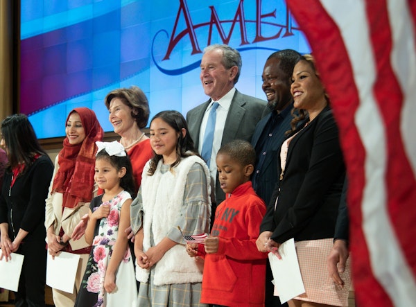 President George W. Bush and Mrs. Bush at a naturalization ceremony in Dallas, Texas.