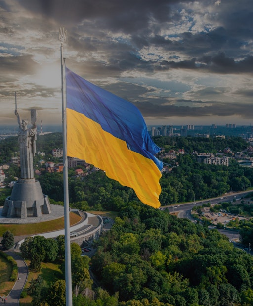 Ukrainian flag on the top of the capital building.