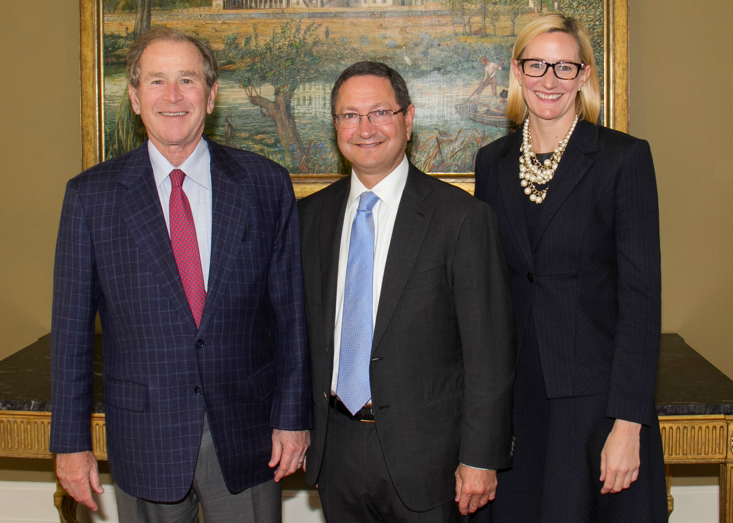 Former President George W. Bush, talks with Texas Rangers CEO