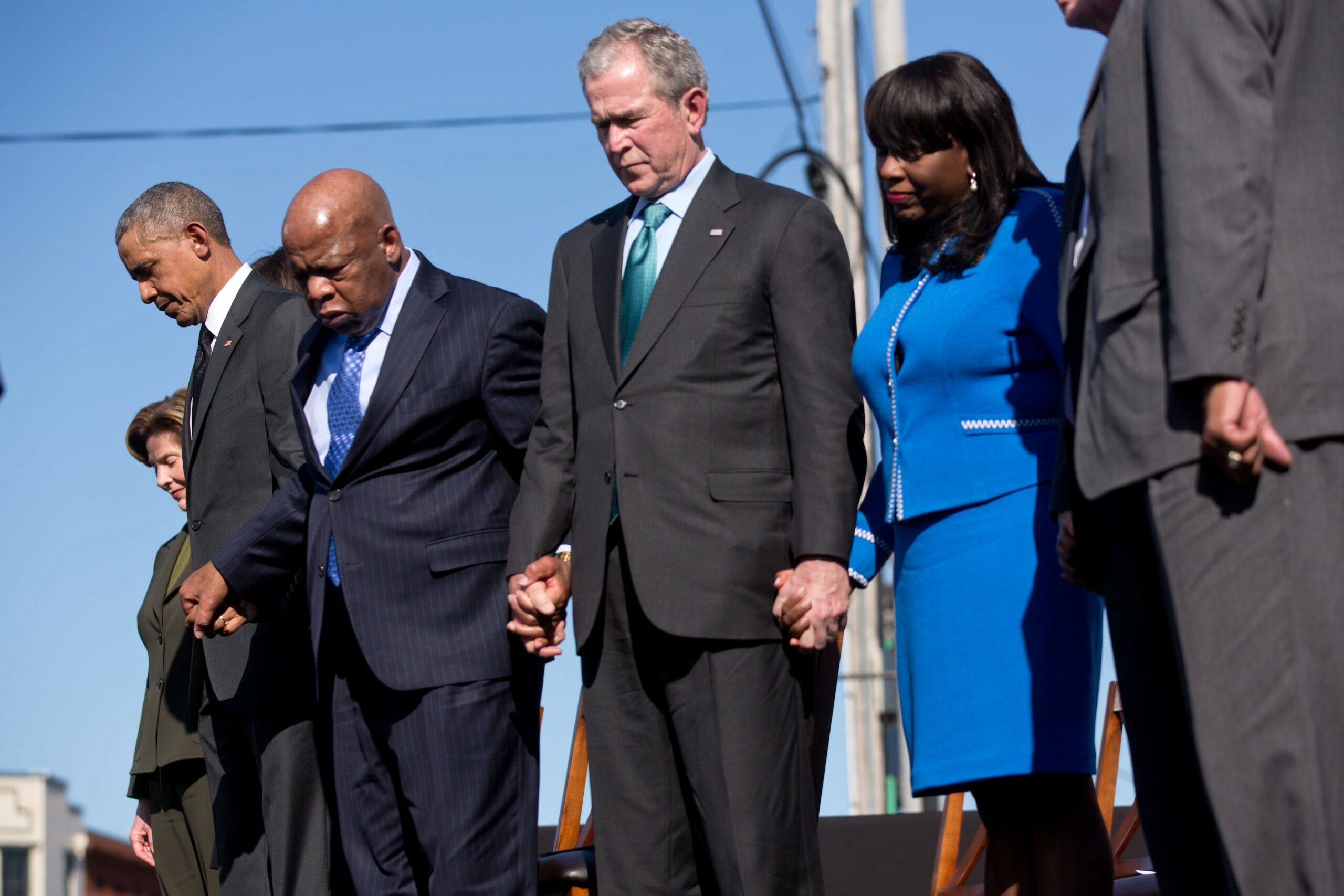 Former President George W. Bush, talks with Texas Rangers CEO