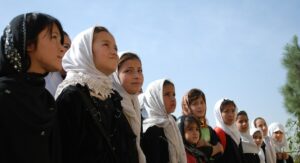 Row of five Afghan girls.